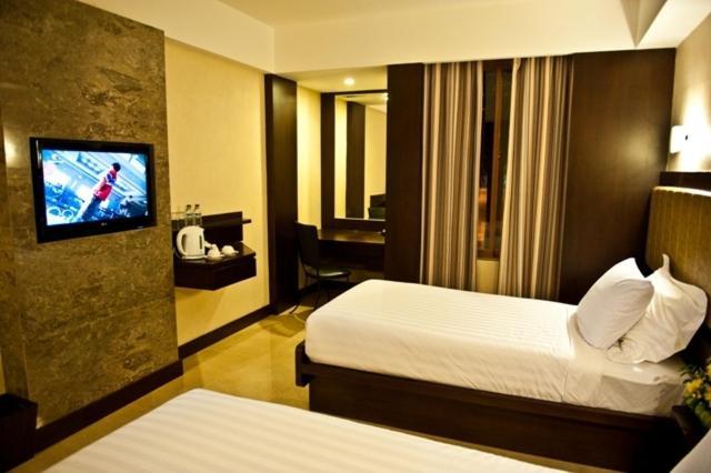 Crown Victoria Hotel Tulungagung Rom bilde